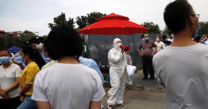 Beijing residents rush coronavirus test clinics as emergency rules expand