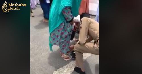 Saudi policeman takes off shoes, puts it on old female pilgrim’s feet